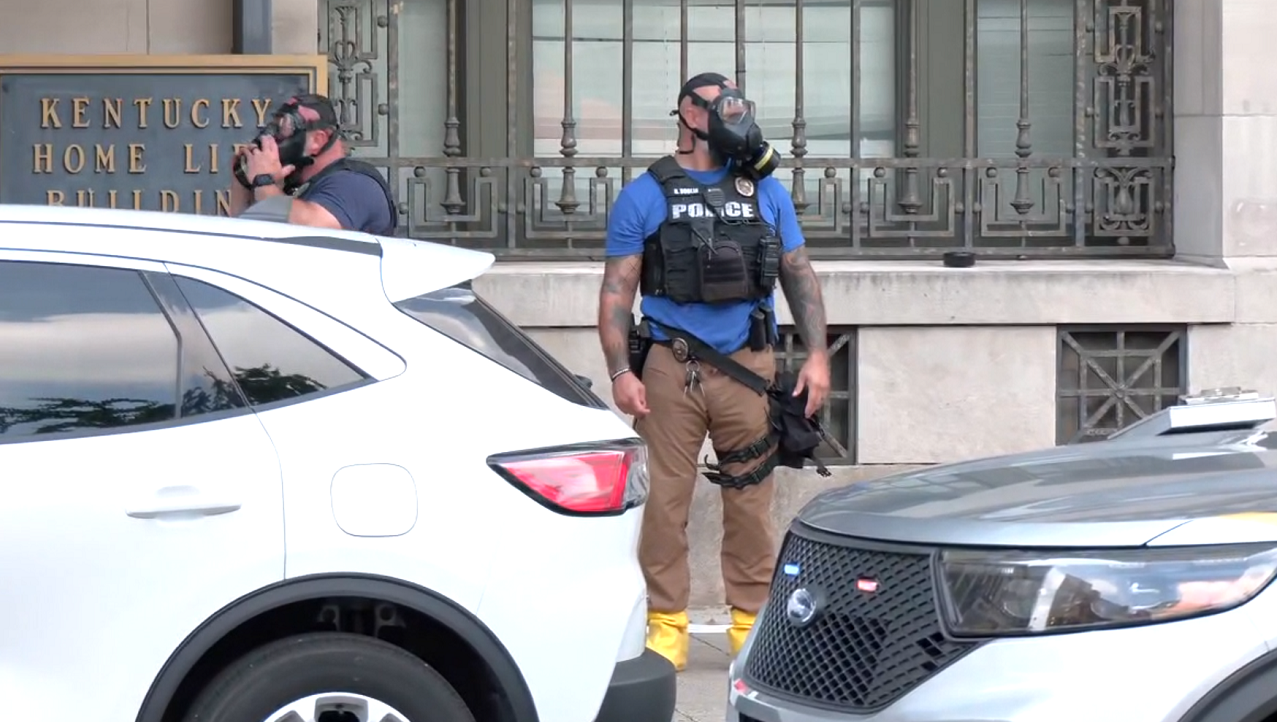 Louisville police, city officials clear trespassers from vacant Kentucky Home Life Building